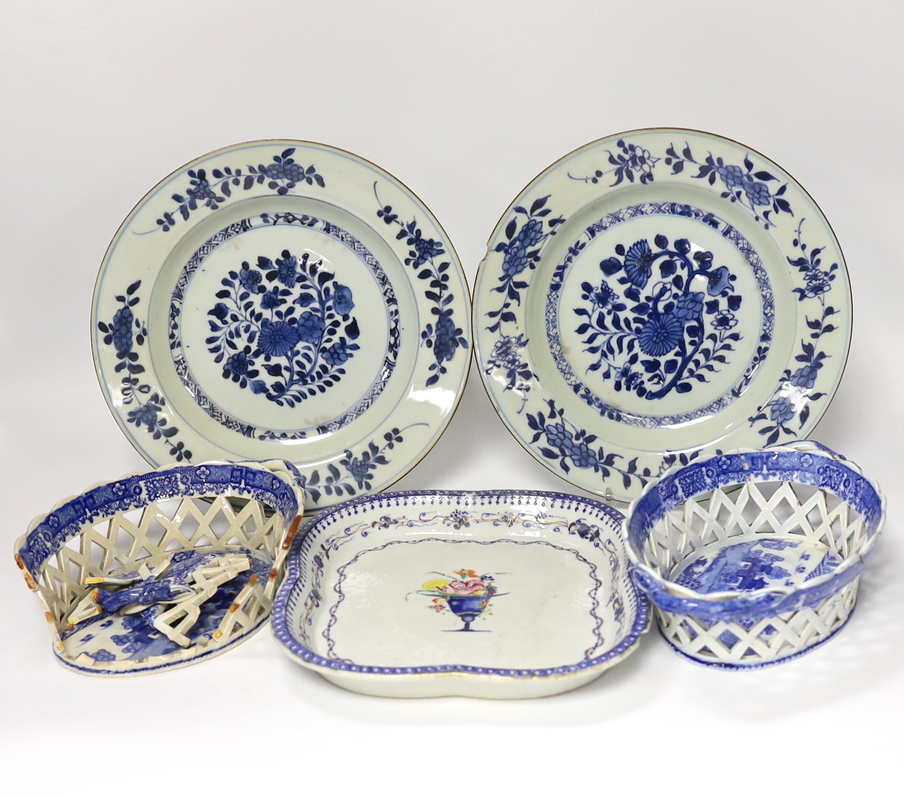 A Chinese porcelain serving dish and a pair of plates, and a pair English blue and white chestnut baskets, largest 23cm diameter (a.f.)